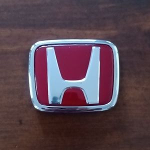 Red Honda car emblem